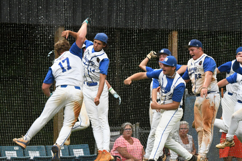 Manning-Santee's Josh Niswonger (17) celebrates a home run with his teammates during their matchup with Horry on Monday.