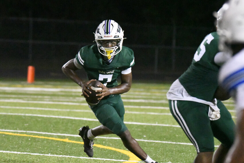 Lakewood quarterback Justin Wilder runs against Dreher on Friday.