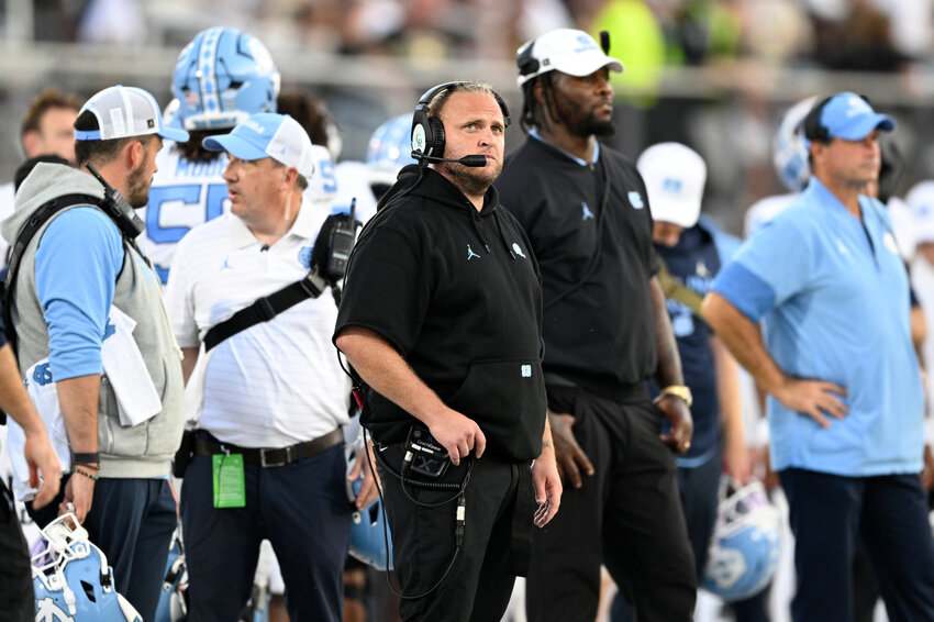 North Carolina defensive coordinator Steve Belichick, center, looks on from the sideline against Central Florida on Saturday, Sept. 20, 2025, in Orlando, Florida.