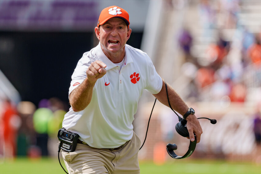 Clemson head coach Dabo Swinney instructs in the second half of an NCAA college football game against North Carolina on Saturday, Sept. 19, 2026, in Clemson, S.C. (AP Photo/Jacob Kupferman)