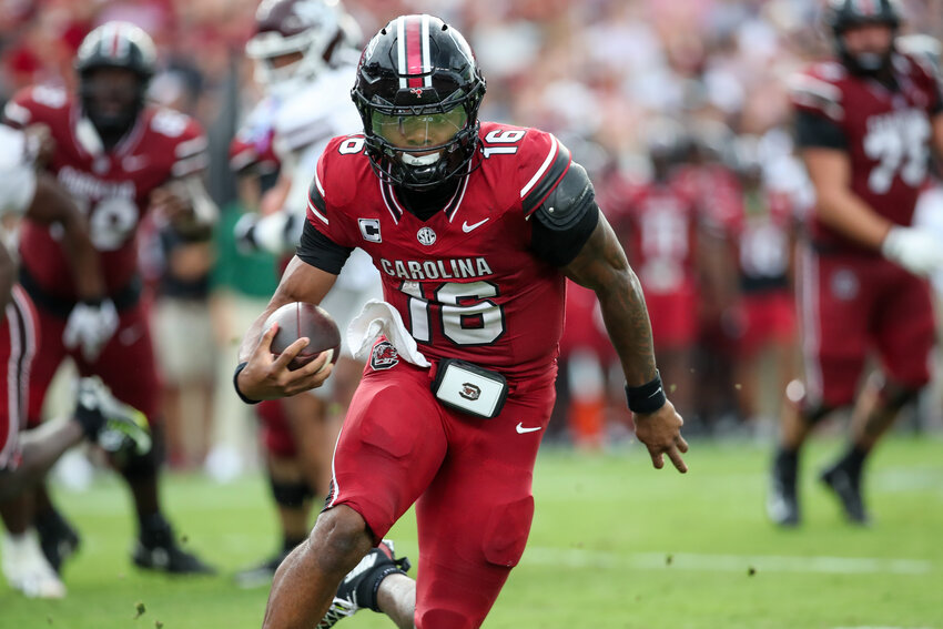 South Carolina quarterback LaNorris Sellers (16) runs for a first down during the first half of an NCAA college football game against Mississippi State, Saturday, Sept. 19, 2026, in Columbia, S.C. (AP Photo/Artie Walker Jr.)