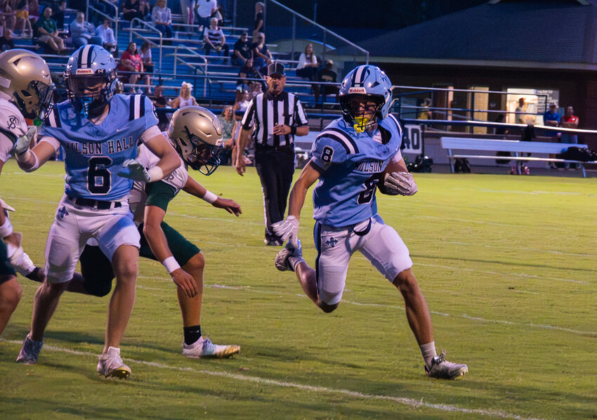 Wilson Hall's Shep Vincent (8), seen carrying the ball against Thomas Sumter, caught the game-winning touchdown and intercepted a pass against Florence Christian on Friday.