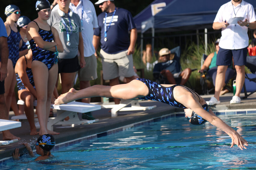 Wilson Hall's Bella Wassmuth, seen diving into the pool during the Northwood Academy Invitational on Saturday, Sept. 12, set the school record in the Barons' final home meet on Saturday, Sept. 26.