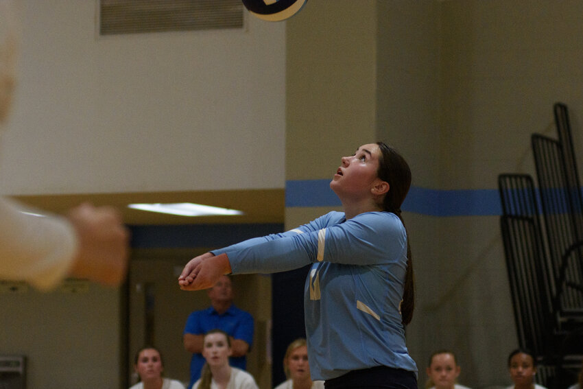 Wilson Hall's Savannah Wells passes the ball against Laurence Manning on Tuesday.