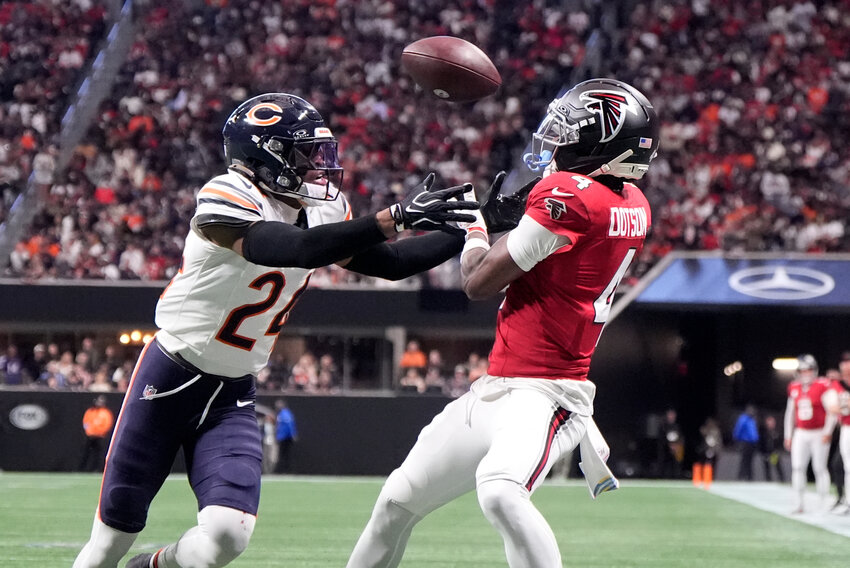 associated press  Atlanta Falcons wide receiver Jahan Dotson (4) catches a touchdown pass ahead of Chicago Bears cornerback Malik Muhammad (24) in Atlanta on Sunday, Oct. 18, 2026.