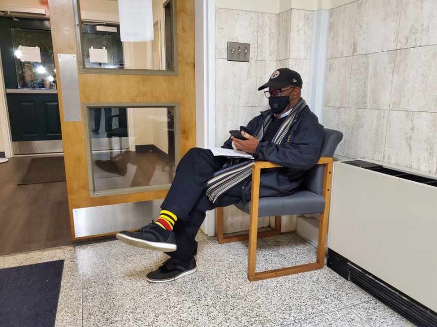 James Blassingame awaits results at the old Sumter County courthouse Tuesday night. He won the runoff for Sumter City Council Ward 2.