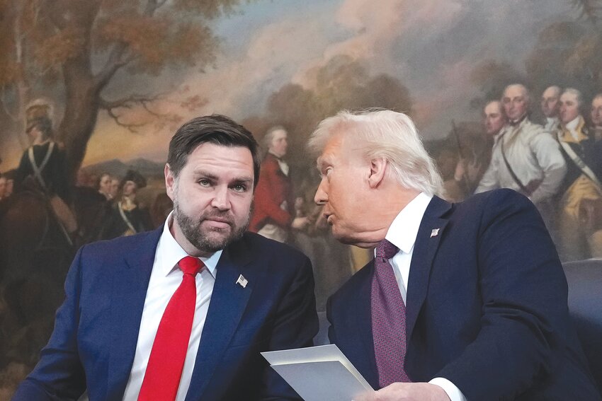 Donald Trump speaks with JD Vance, left, before taking their oaths of office during the Inauguration ceremonies in the Rotunda of the U.S. Capitol in Washington on Monday, Jan. 20, 2025.