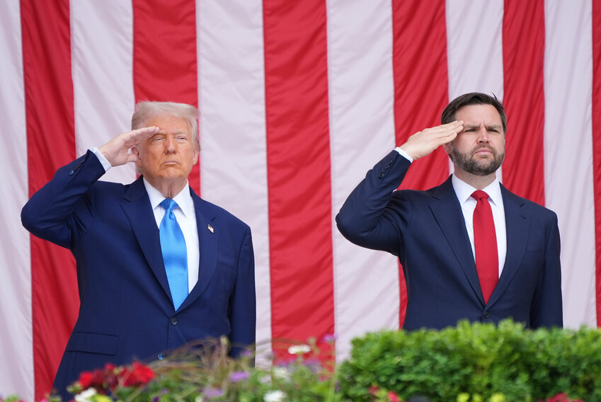 President Donald Trump and Vice President JD Vance salute during the 157th National Memorial Day Observance at Arlington National Cemetery, Monday, May 26, 2025, in Arlington, Va.