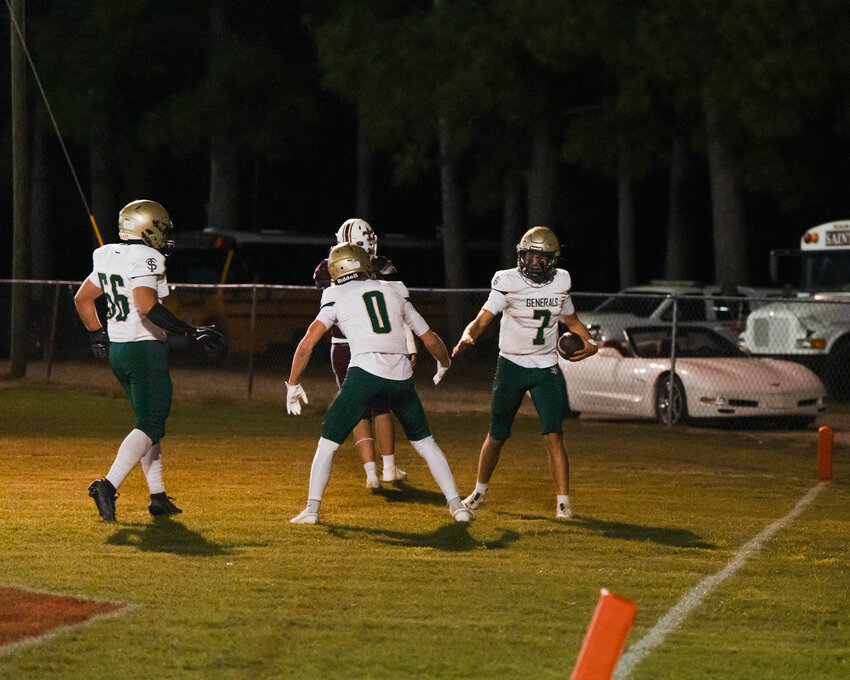 Thomas Sumter's Clay Team (7) celebrates a touchdown against Clarendon Hall on Friday.