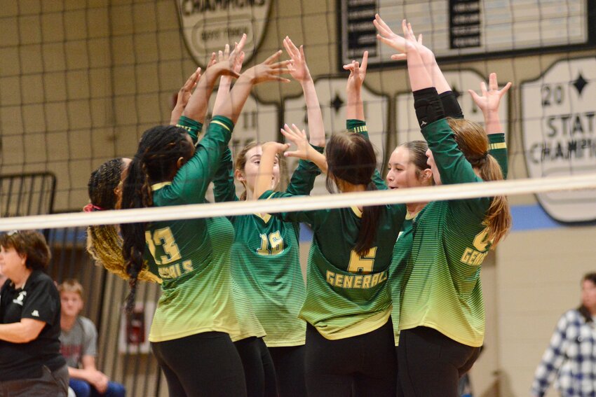 The Thomas Sumter volleyball team, seen celebrating during the Baron Bash on Saturday, Oct. 4, won a pair of region games over Clarendon Hall and Calhoun Academy this week.