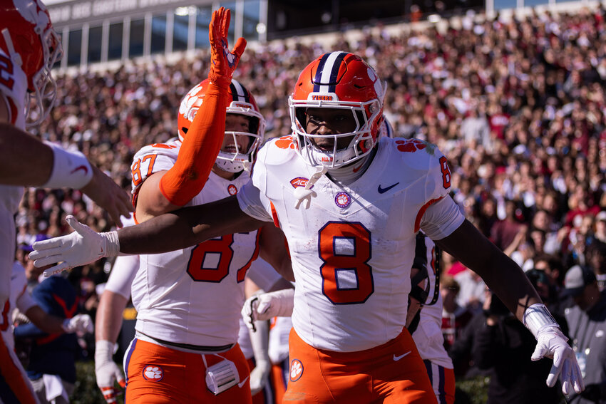 Clemson running back Adam Randall (8) celebrates after a touchdown against South Carolina on Saturday, Nov. 29, 2025, in Columbia.