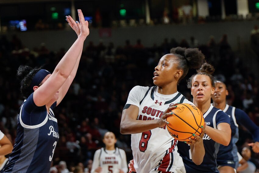 South Carolina forward Joyce Edwards (8) drives to the basket against Penn State guard Moriah Murray, left, in Columbia on Sunday, Dec. 14, 2025.