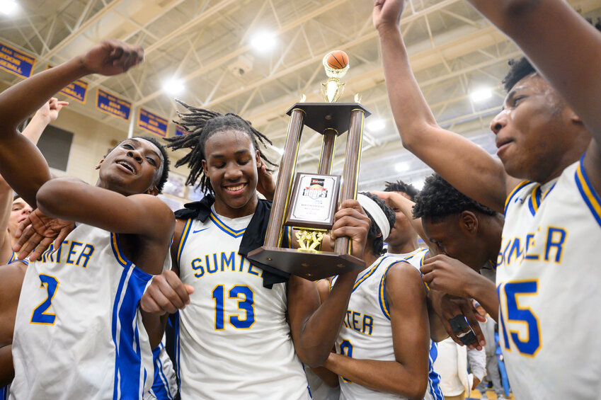 Sumter High's BJ Brown (13) and the Gamecocks celebrate their overtime win over Westwood on Friday.