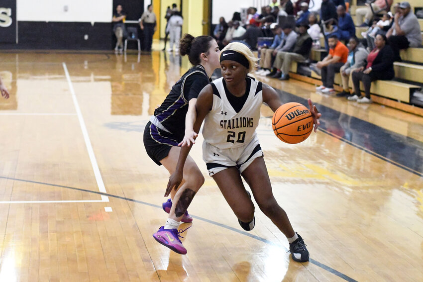 Lee Central's Serenity Williams drives against Ware Shoals on Friday.