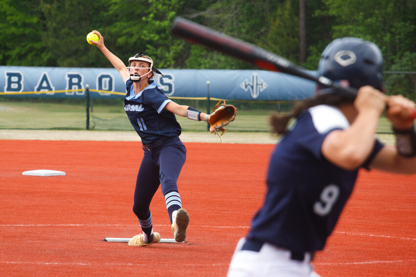 Wilson Hall's Marsha Kate Skey, left, threw a no-hitter against Westside in the Pee Dee Pitch Off on Friday.