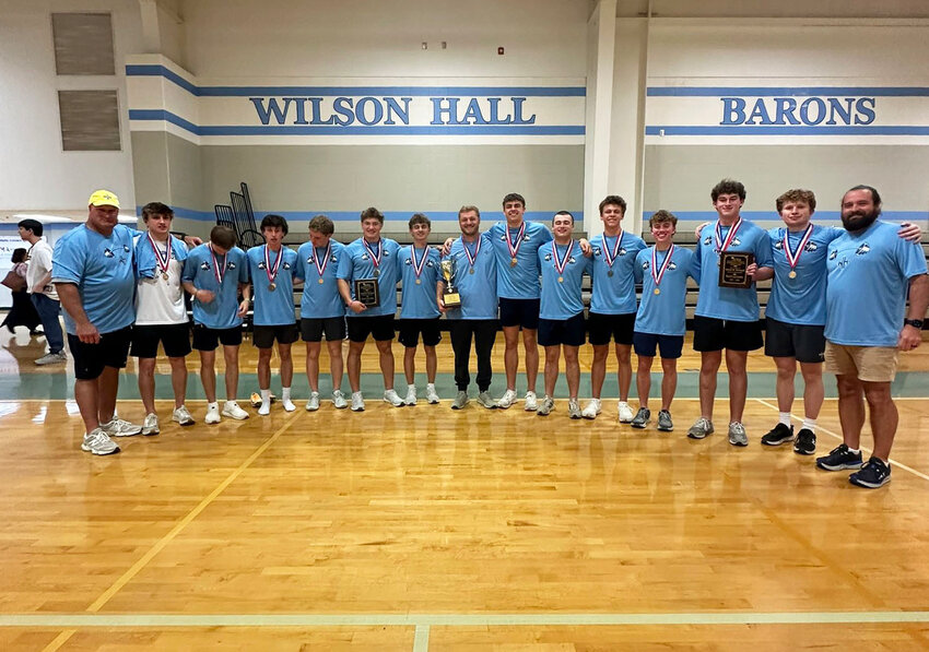 The Wilson Hall speed and strength team poses after winning the SCISA state title on Saturday.