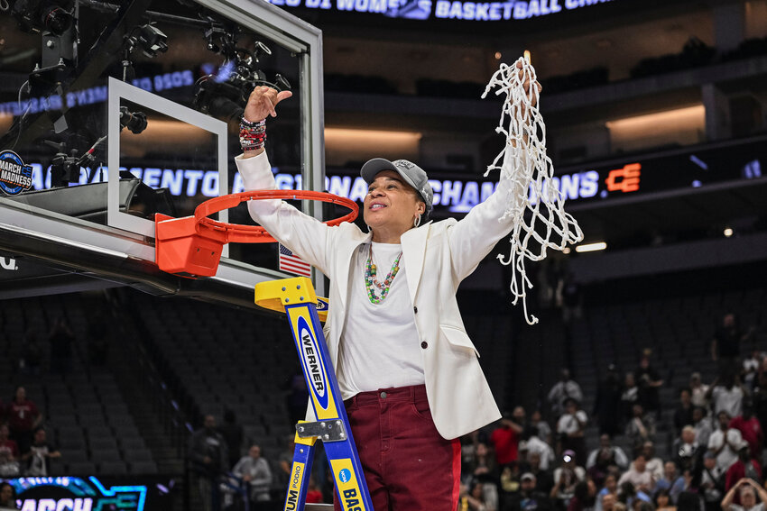South Carolina head coach Dawn Staley celebrates cutting down the net after the Gamecocks beat TCU in the Elite Eight of the NCAA tournament on Monday, March 30, 2026, in Sacramento, California.