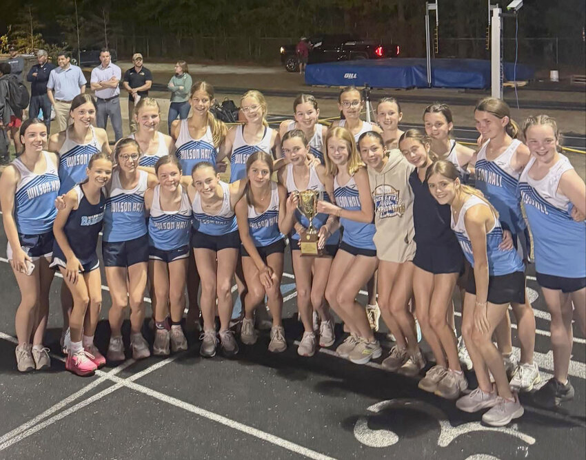 The Wilson Hall middle school girls track team poses after winning the SCISA state title Tuesday, March 31.