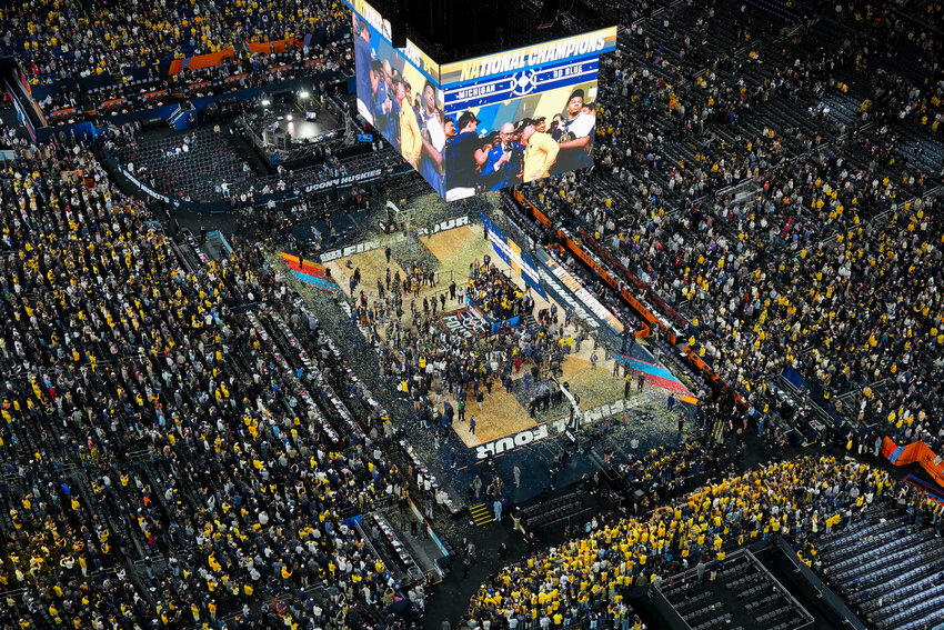Michigan celebrates after defeating UConn in the national championship game at the Final Four on Monday, April 6, in Indianapolis.