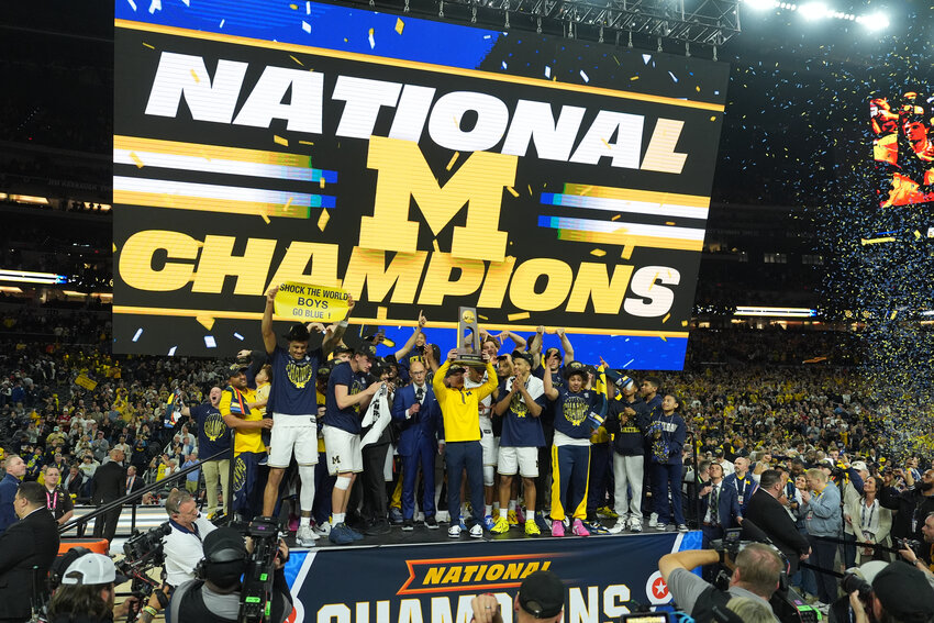 Michigan celebrates after defeating UConn in the NCAA national championship game at the Final Four on Monday, April 6, in Indianapolis.