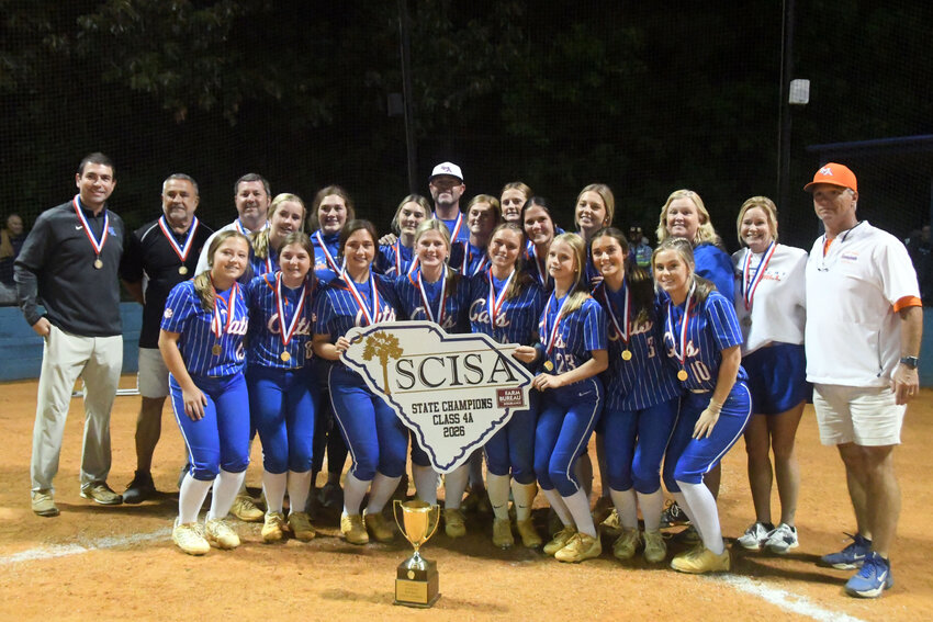 The Laurence Manning softball team poses with their trophy after winning the SCISA 4A state championship over Pinewood Prep on Tuesday.