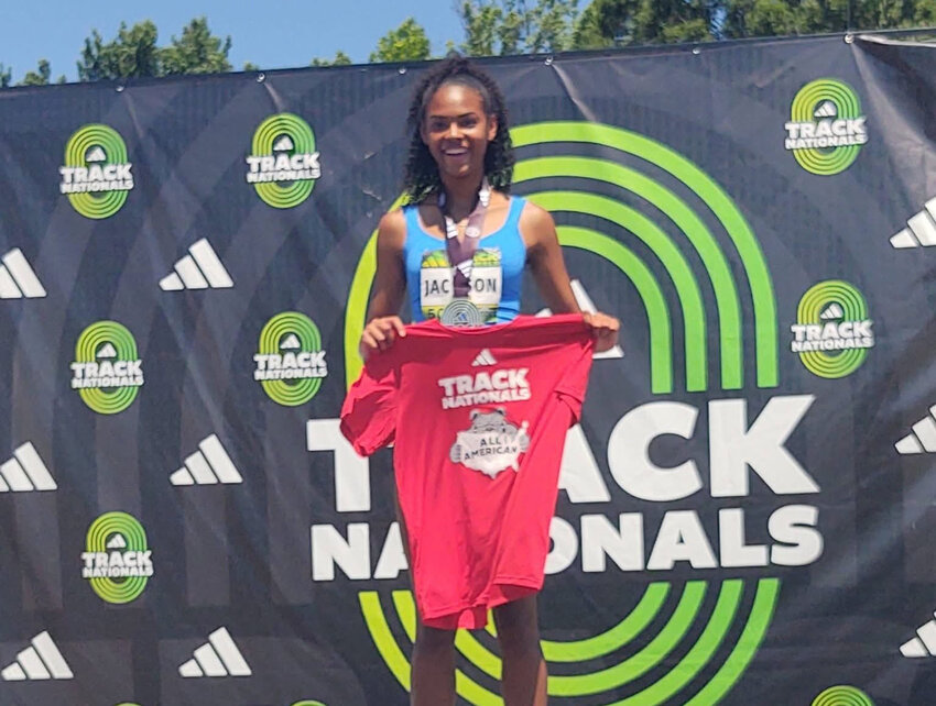Sumter High's Danabella Jackson stands atop the podium after winning the high jump at the Adidas Outdoor Nationals on Sunday, June 21.