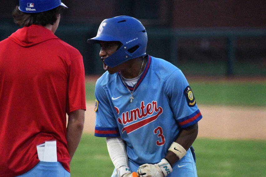 Sumter's Larry Johnson celebrates a two-run single against Rock Hill on Wednesday.