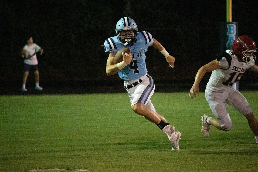 Wilson Hall's Nolan Gooch carries the ball against Orangeburg Prep on Friday, Aug. 21.