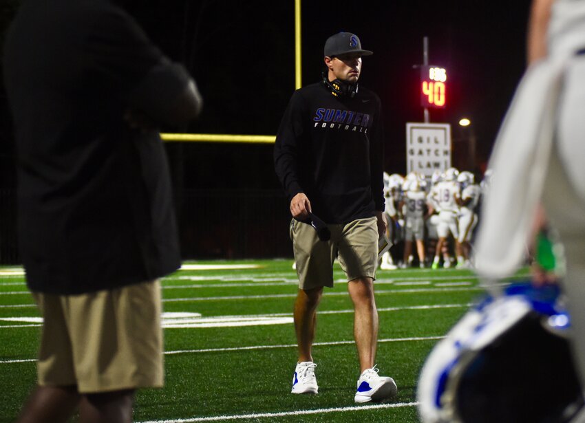 Sumter High head coach Drew Marlowe walks the sideline at Summerville on Friday.