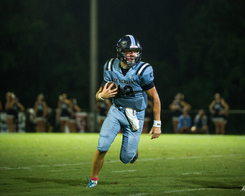 Lee Academy quarterback Landen Olson, seen against Colleton Prep on Aug. 21, passed for two touchdowns, ran for another and returned a fumble for a score in the Cavs' win over Camden Military on Friday.