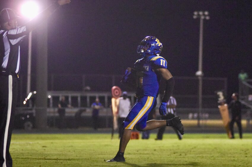 Scott's Branch senior Quintin Jackson crosses the goal line after scoring a touchdown against Lake View on Friday, Sept. 11.