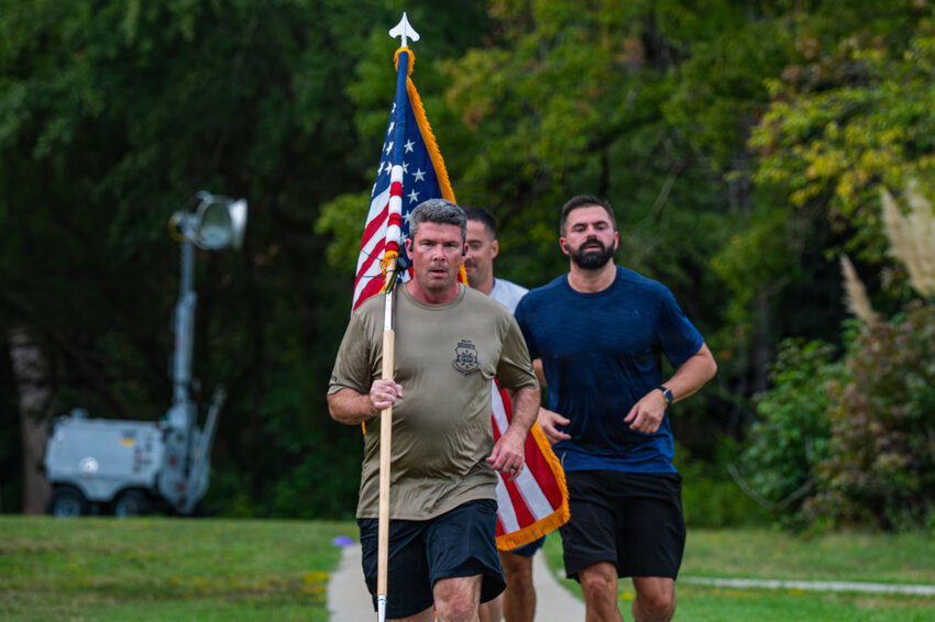 U.S. Air Force Lt. Col. Jarred Chamberland, assigned to Ninth Air Force (U.S. Air Forces Central), runs during the 2026 9/11 Memorial Run &amp; Walk event at Shaw Air Force Base, South Carolina, Sept. 11, 2026. During the memorial event, the Shaw Air Force Base community commemorated the actions of the first responders at the scenes of the 9/11 attacks, the servicemembers who deployed across the world to combat terrorism in the years that followed.