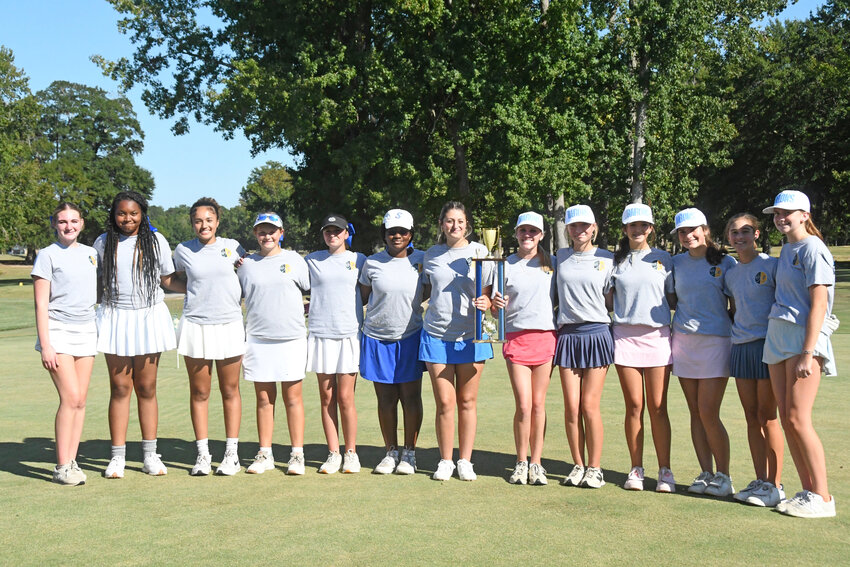 The Sumter High and Wilson Hall girls golf teams pose with the trophy for their Ryder Cup-style series before the final round of golf on Thursday.