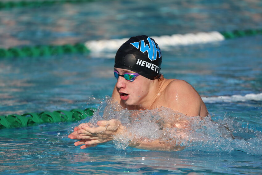 Wilson Hall's Jacob Hewett, seen swimming at the Northwood Invitational on Sept. 12, broke his own school record in the breaststroke at the Pinewood Invitational on Saturday.