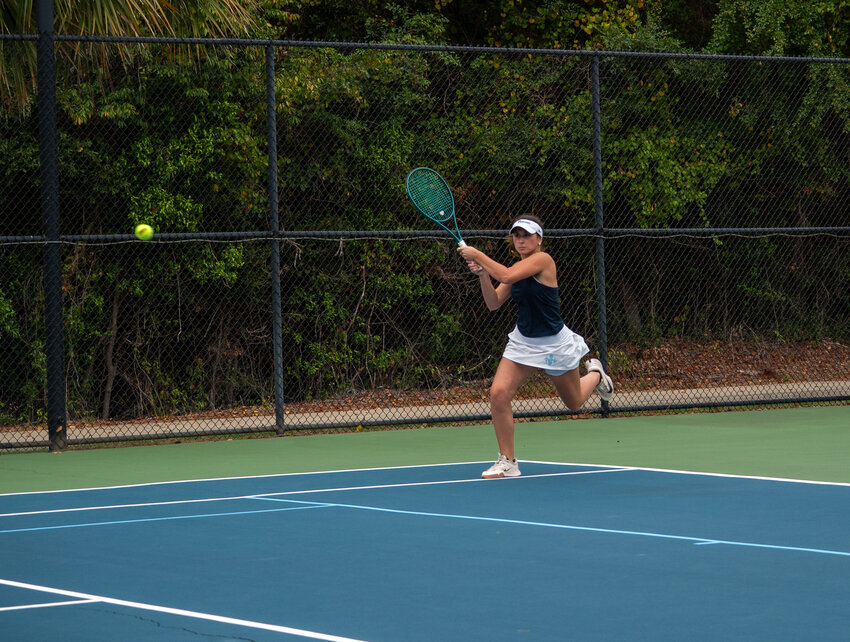 Wilson Hall's Harper Burke, seen against Laurence Manning, had the Lady Barons' lone victory in their playoff loss to Porter-Gaud on Tuesday.