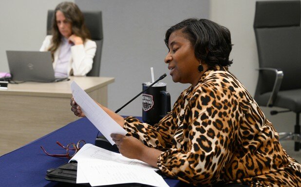 Sumter School District Chief Financial Officer Shatika Spearman presents a monthly financial report to Sumter school board at a recent meeting at the district office.