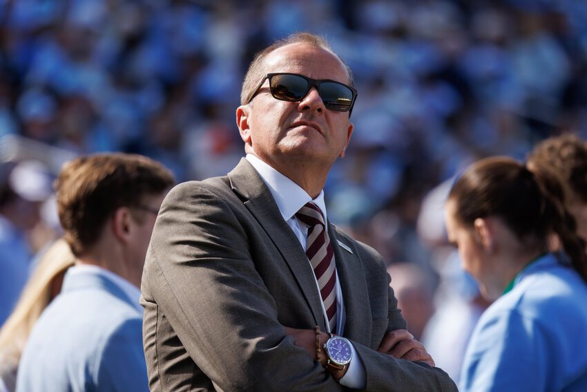 ACC Commissioner Jim Phillips walks the sideline during a football game between North Carolina and Virginia in Chapel Hill, North Carolina, on Oct. 25, 2025.