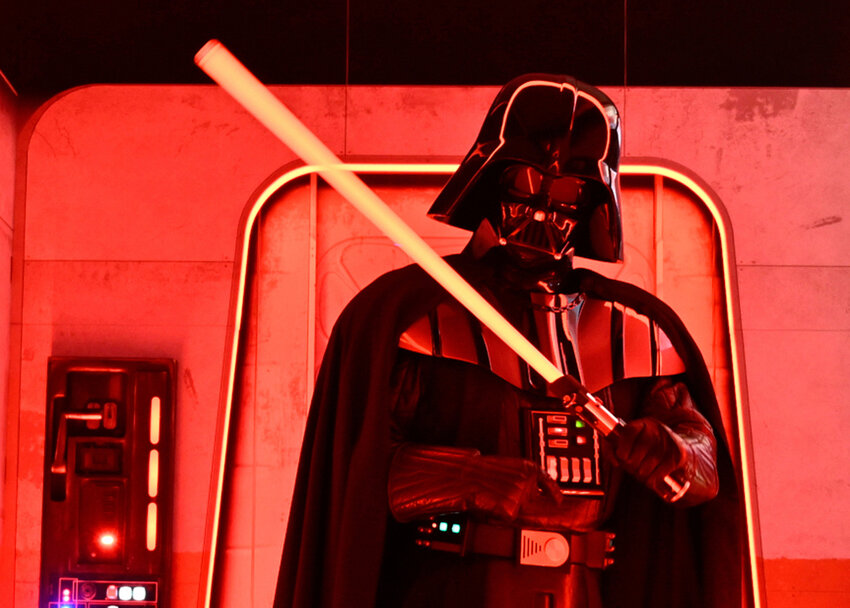 A Darth Vader costumed character poses at the Hasbro and Amazon Star Wars interactive Imperial March experience at the Empire State Building March 21, 2024, in New York.