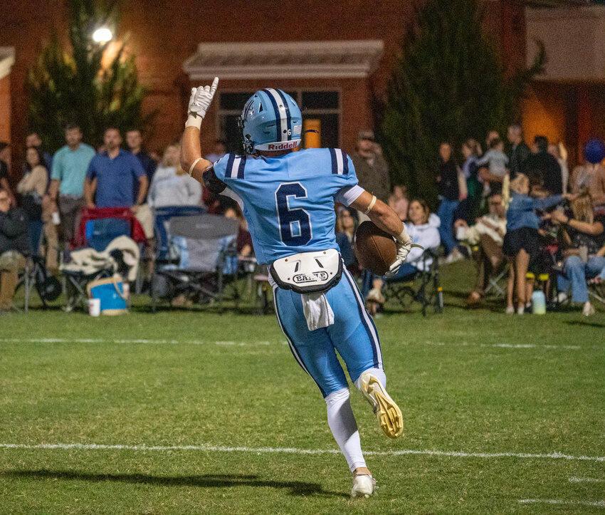 Wilson Hall's Shep Vincent strolls into the end zone for a kick return touchdown against Spartanburg Christian on Friday.