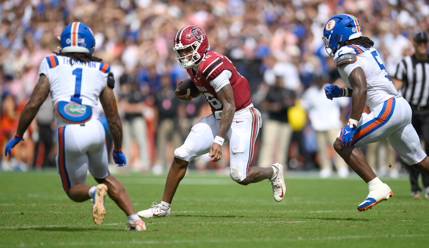 South Carolina quarterback LaNorris Sellers (16) rushes against Florida on Saturday, Oct. 10, in Gainesville, Florida.