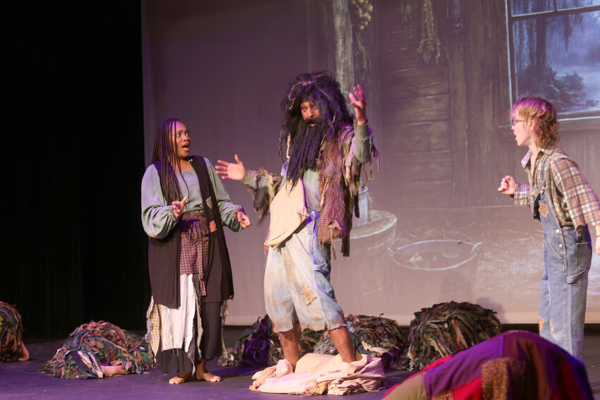 From left, Caitlyn Joi as Mammy, Keighan Norton as Hairy Man and Nate Martin as Wiley are seen in Sumter Little Theatre's "Wiley and the Hairy Man."