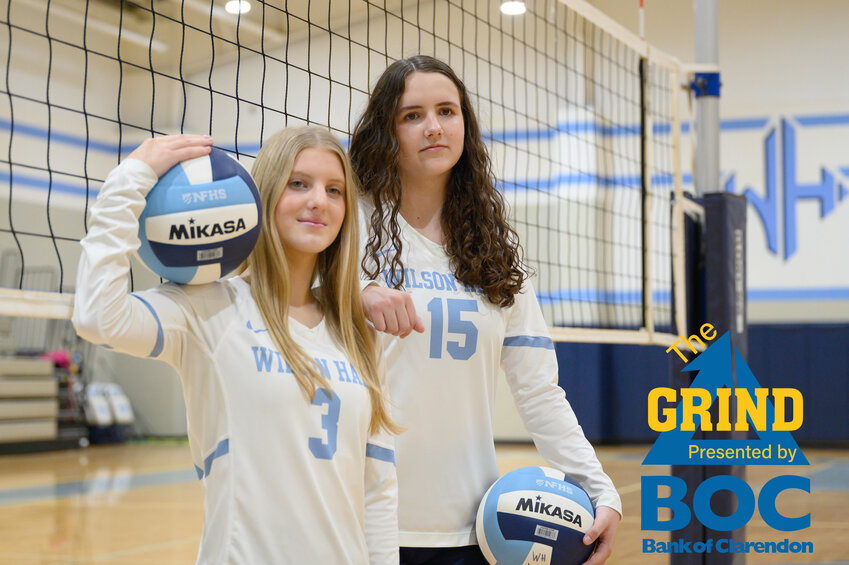 Stepsisters Mary Todd Champion, right, and Natalie Hawkey work together on Wilson Hall's volleyball team and make a formidable duo on and off the court.