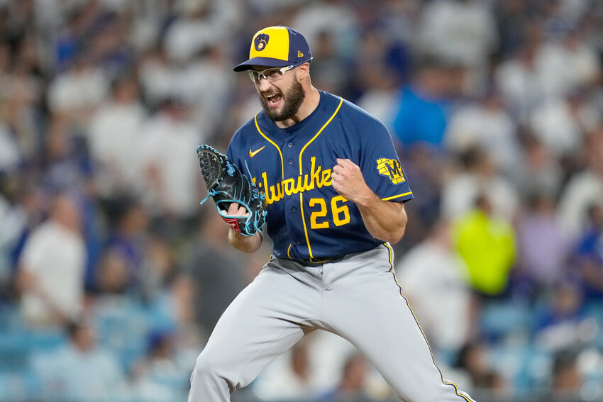 Milwaukee Brewers pitcher Aaron Ashby celebrates the final out of Game 4 of the National League Championship Series against the Los Angeles Dodgers on Thursday, Oct. 15, in Los Angeles.