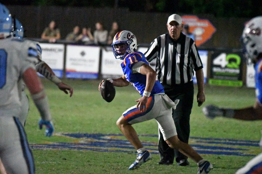 Laurence Manning's Grainger Powell, seen against Wilson Hall on Sept. 18, threw four touchdowns' in the Swampcats' win over John Paul II on Friday.