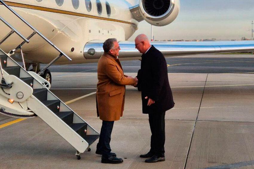Russian presidential envoy Kirill Dmitriev, right, greets U.S. special envoy Steve Witkoff at the international airport outside St. Petersburg, Russia, on Wednesday, Oct. 21, 2026.