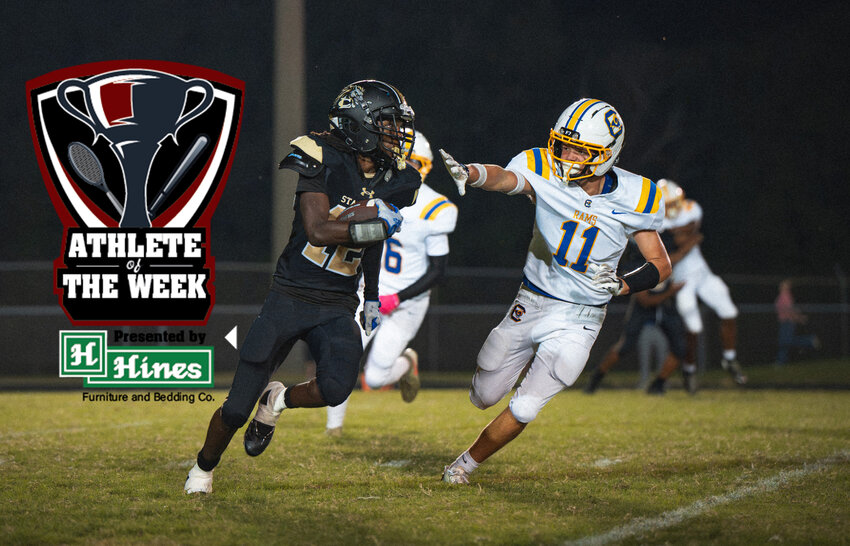 Lee Central's Tyquaze Belle (12) returns an interception against Chesterfield on Friday, Oct. 16, which helped him earn Hines Furniture Athlete of the Week honors.