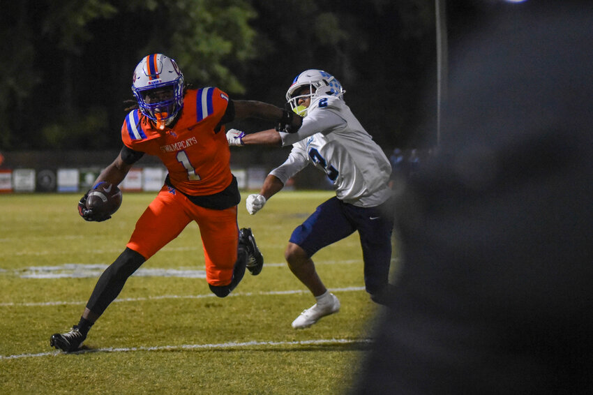 Laurence Manning's Scoop Dennis (1) carries the ball against Pinewood Prep on Friday.