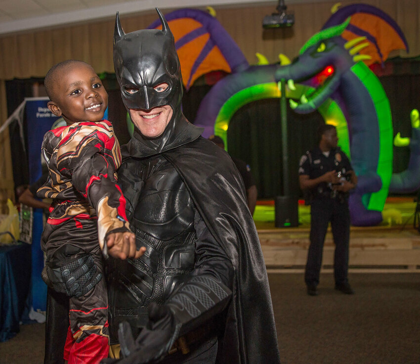 Detective Sgt. Howie Austin of Sumter Police Department and with DJ Howie D Entertainment dresses as Batman for Trick-or-Treat with Sumter's Superheroes during a past year. This year's event is on Friday, Oct. 30, at Crosswell Drive Elementary School.