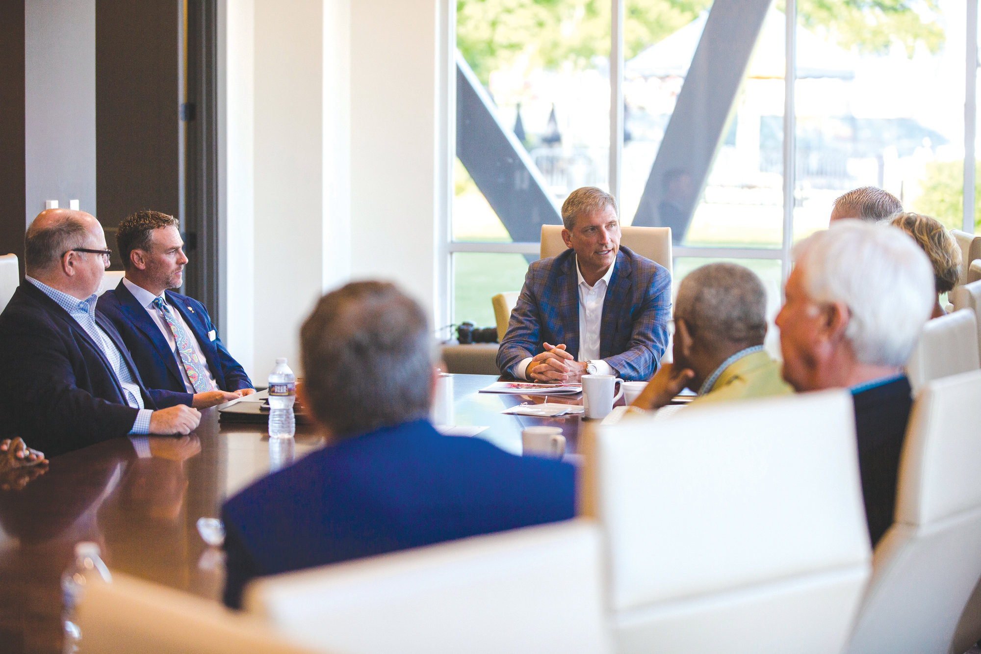 Sumter private business leader Greg Thompson, center, leads Thursday&rsquo;s discussion among community leaders and public charter school officials. Thompson said he&rsquo;s putting his energies toward developing such a school in Sumter now.